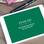 INSEAD logo on an ipad