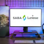 Computer displaying the Lumesse logo