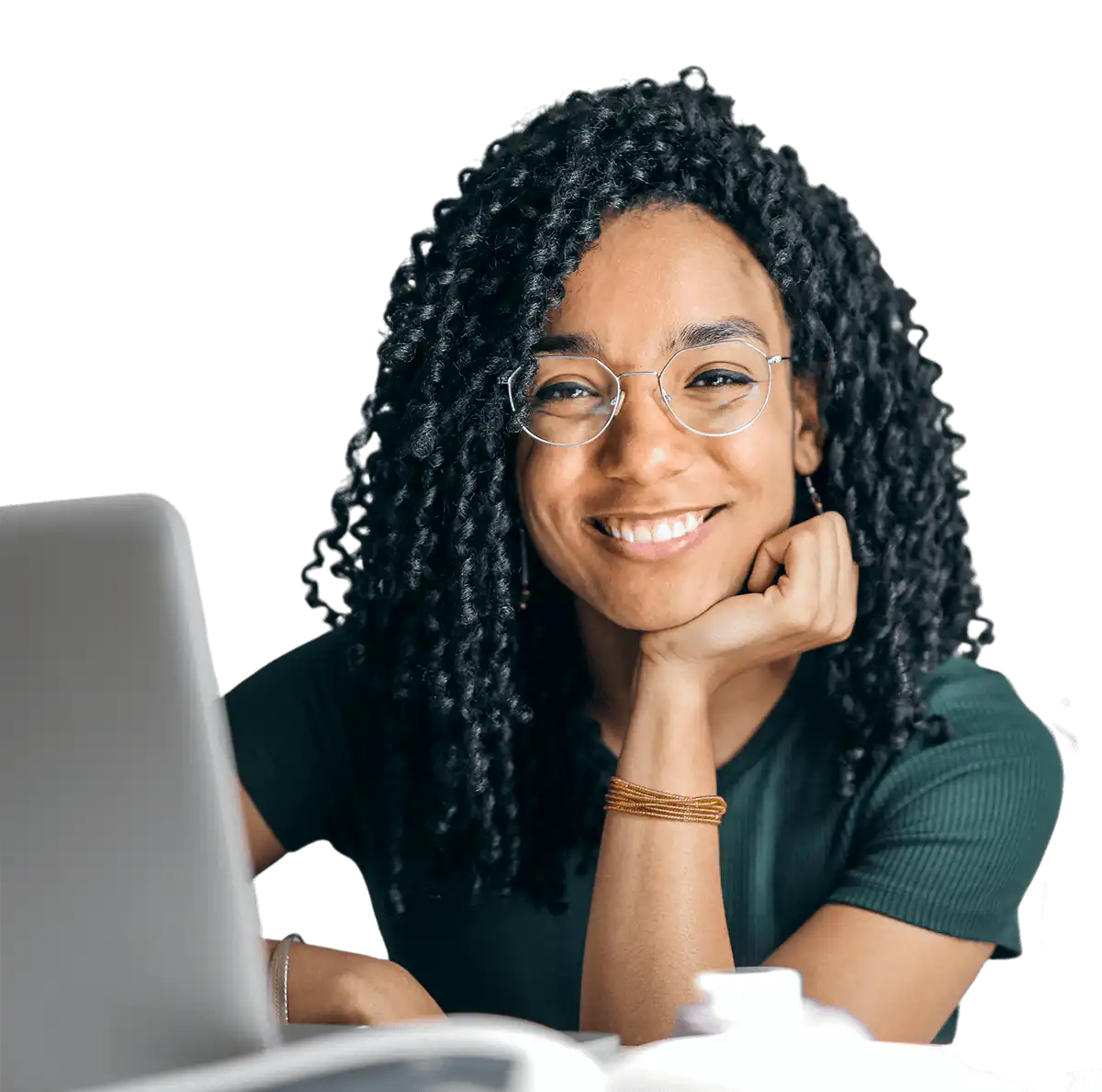Employee working at their desk and smiling