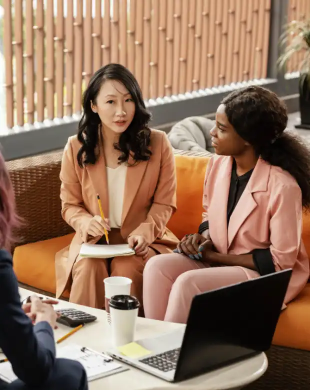Professional team collaborating in a modern workspace, representing Korean translation and localization